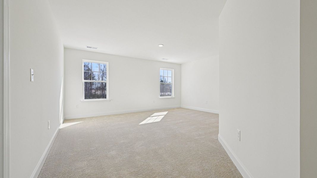 Representative furnished interior of a home built from the Wagener by DRB Homes in Station Pointe, Angier (Image 28).