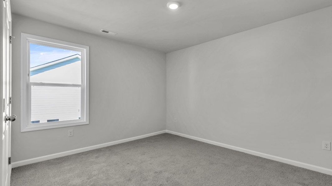 Spacious, unfurnished interior of a new home in Horton Park, Apex (Image 17).