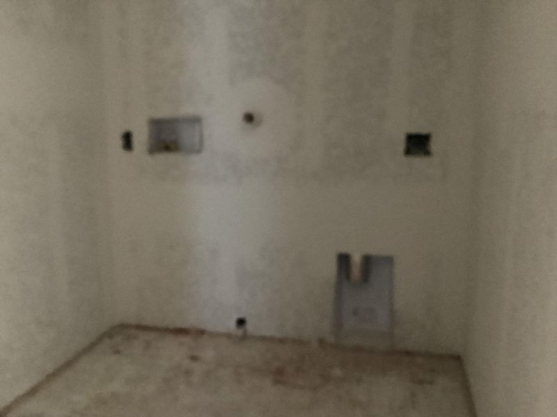 In-progress construction of a new home in The Homestead at Lariat, Liberty Hill, TX (Image 30).