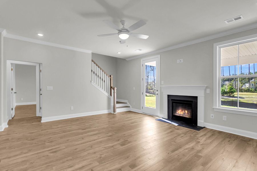 Spacious, unfurnished interior of a new home in Tidewater at Lakes of Cane Bay, Summerville (Image 13).