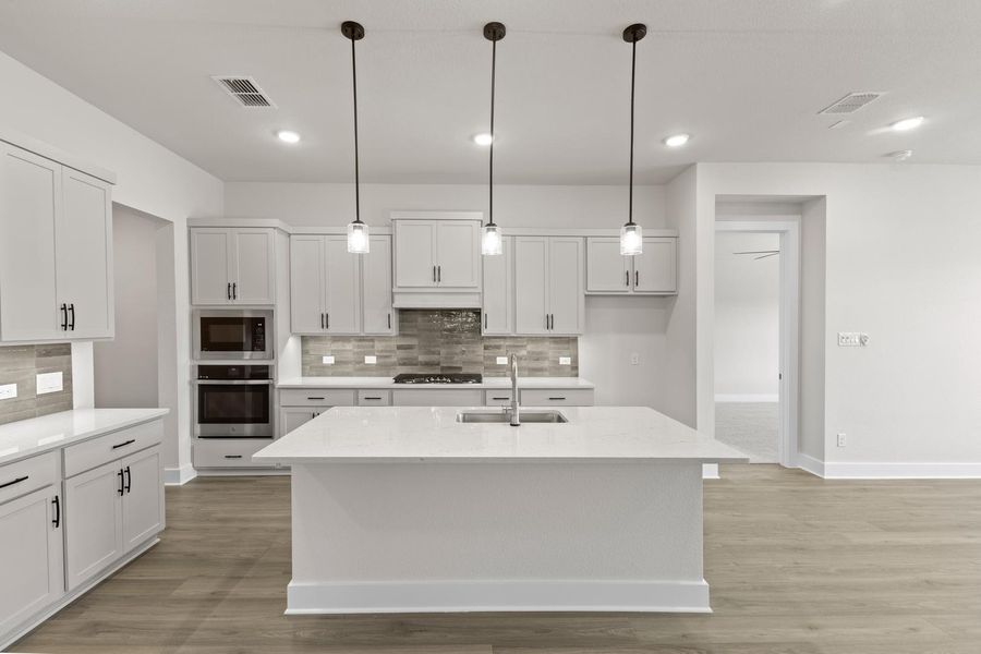 Furnished interior view inside a new home in Union Park, Little Elm (Image 5). Furnished interior view inside a new home in Union Park, Little Elm (Image 5).