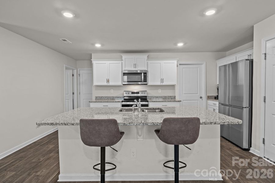 Furnished interior view inside a new home in Mills at Long Creek, Dallas (Image 12).