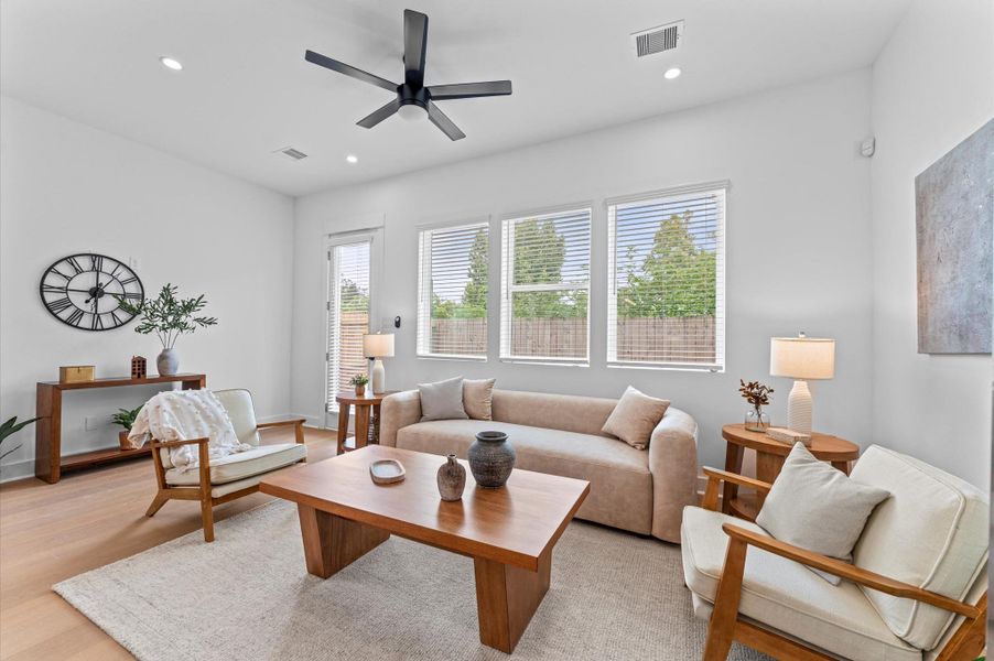 This stunning first-floor open-concept living space blends modern elegance with functional design. This stunning first-floor open-concept living space blends modern elegance with functional design.