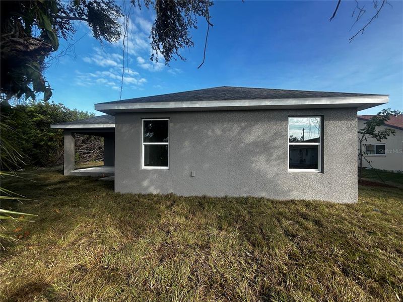 Exterior details and patio area of a home in Port Charlotte, Punta Gorda (Image 4).