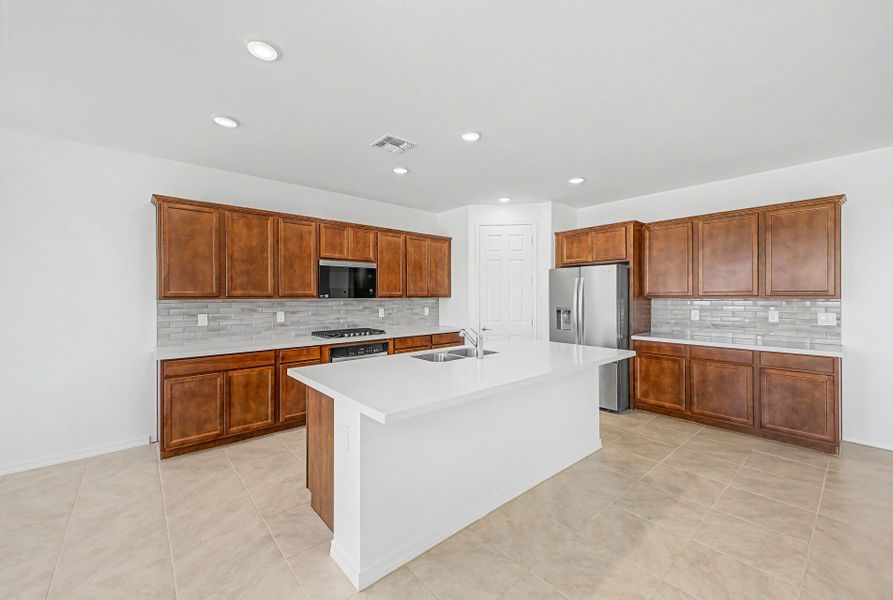 Furnished interior view inside a new home in Bella Vista Farms, San Tan Valley (Image 2).