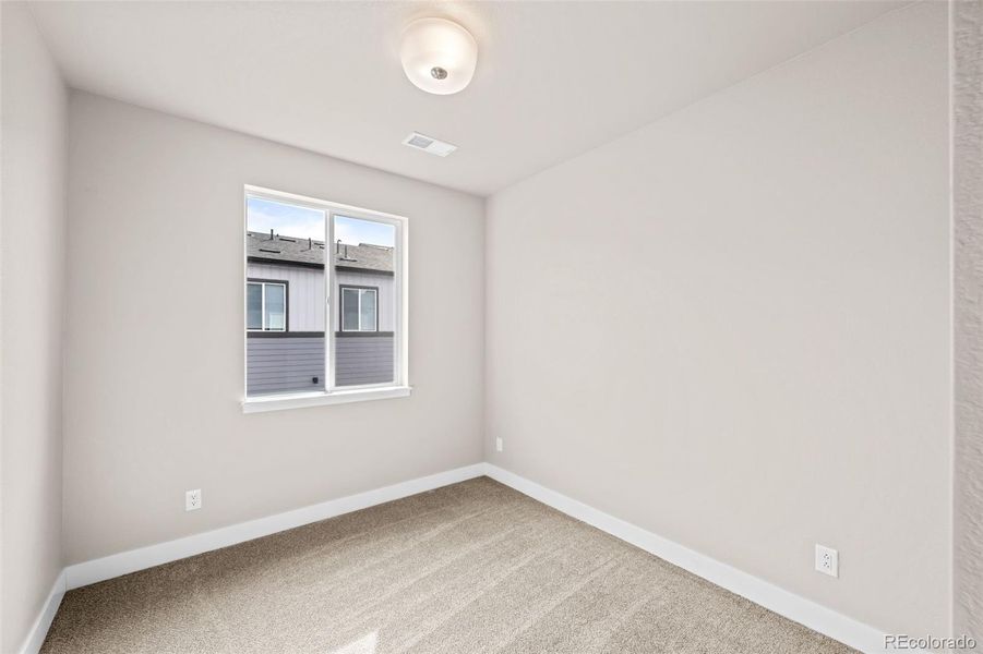 Spacious, unfurnished interior of a new home in Ralston Creek, Arvada (Image 33).