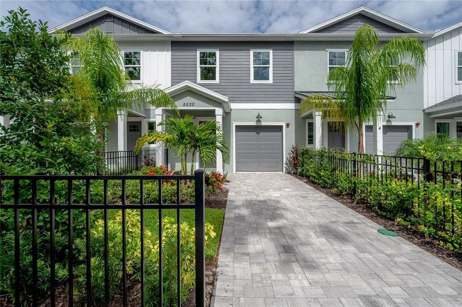 Front exterior of a new home in , Tampa, FL, highlighting curb appeal (Image 2).
