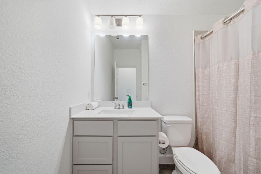 Furnished interior view inside a new home in Artavia, Conroe (Image 6).