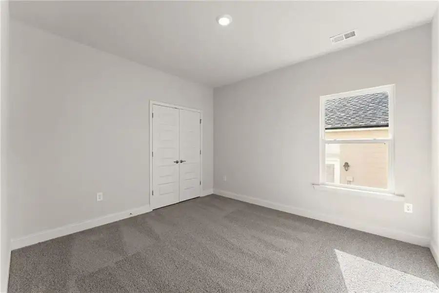 Representative unfurnished interior of a home built from the 1709 by Adams Homes in Ham Farm, La Grange (Image 24).