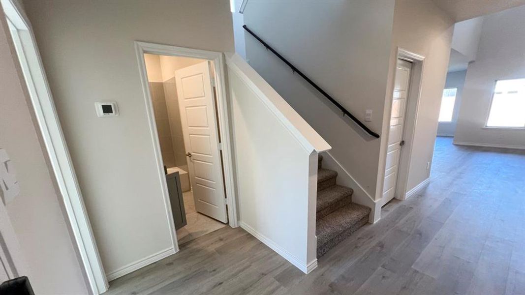 Stairway with wood finished floors