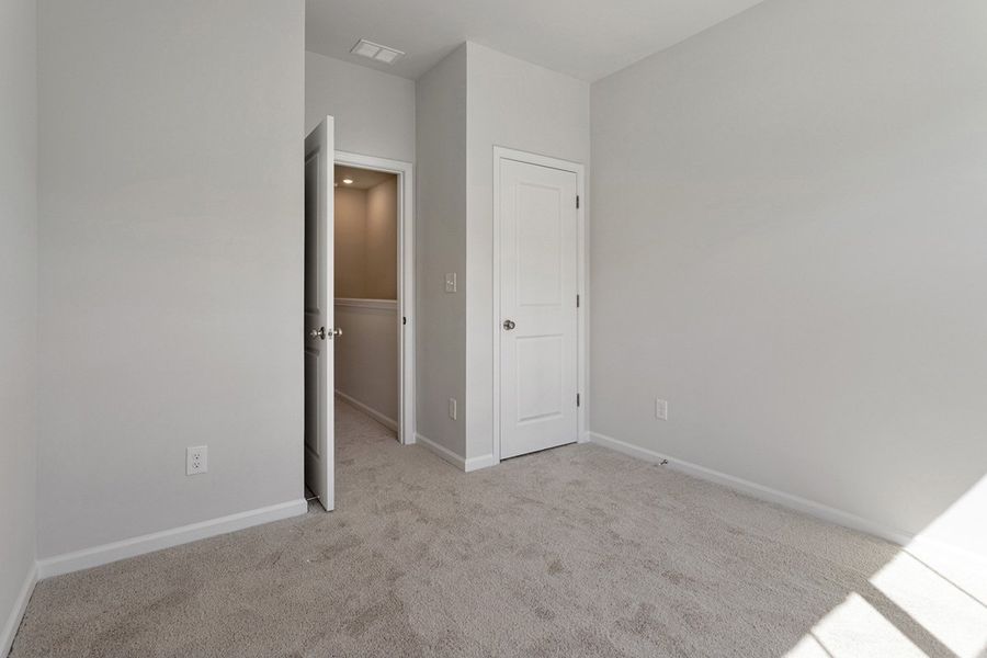 Spacious, unfurnished interior of a new home in Renaissance at White Oak, Garner (Image 22). Spacious, unfurnished interior of a new home in Renaissance at White Oak, Garner (Image 22).