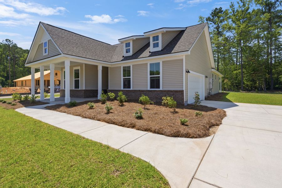 Front exterior of a new home in Oakleaf Chase, Blythewood, SC, highlighting curb appeal (Image 1). Front exterior of a new home in Oakleaf Chase, Blythewood, SC, highlighting curb appeal (Image 1).