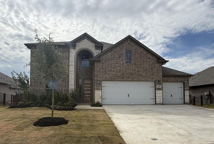 Front exterior of a new home in Silo Mills, Joshua, TX, highlighting curb appeal (Image 2). Front exterior of a new home in Silo Mills, Joshua, TX, highlighting curb appeal (Image 2).