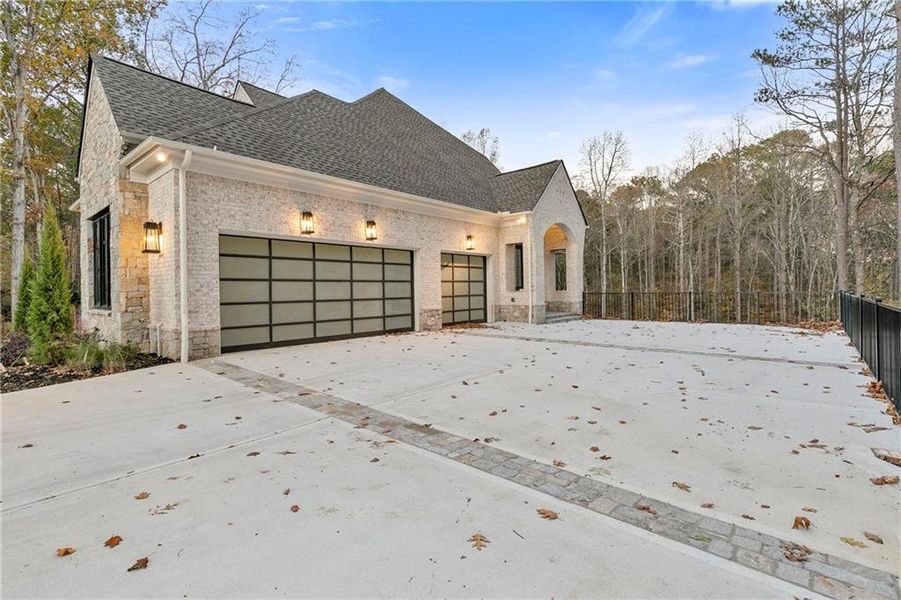Front exterior of a new home in , Johns Creek, GA, highlighting curb appeal (Image 16).