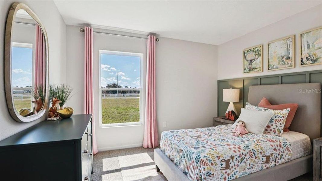 Furnished interior view inside a new home in Lake Deer Estates, Poinciana (Image 28).