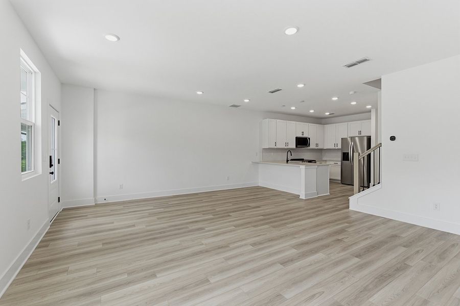 A large empty kitchen. A large empty kitchen.