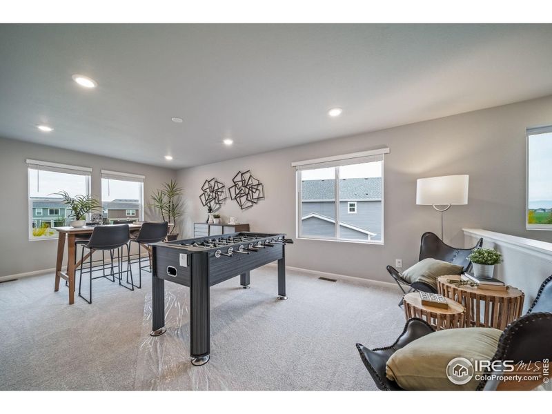 Furnished interior view inside a new home in Thompson River Ranch, Johnstown (Image 10).