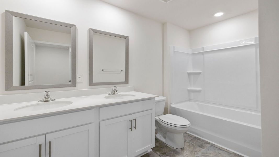 Representative furnished interior of a home built from the Belhaven by D.R. Horton in Forest Brook, Easley (Image 11).