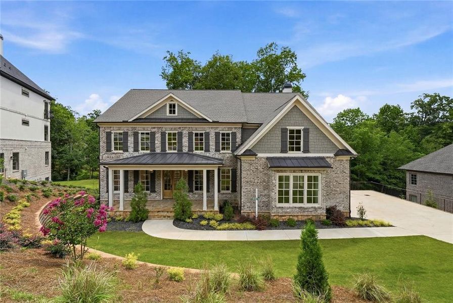 Front exterior of a new home in , Suwanee, GA, highlighting curb appeal (Image 1). Front exterior of a new home in , Suwanee, GA, highlighting curb appeal (Image 1).
