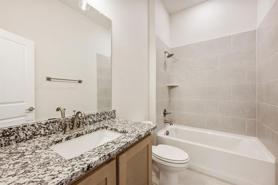 Furnished interior view inside a new home in Waterscape Classic 60s, Royse City (Image 12).