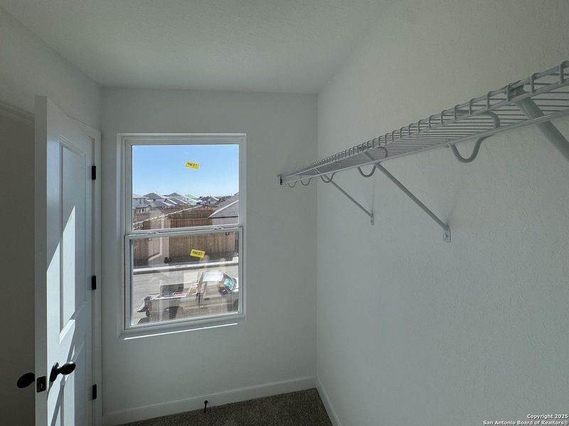 Spacious, unfurnished interior of a new home in Enclave at Hennersby Hollow 50's, San Antonio (Image 24).