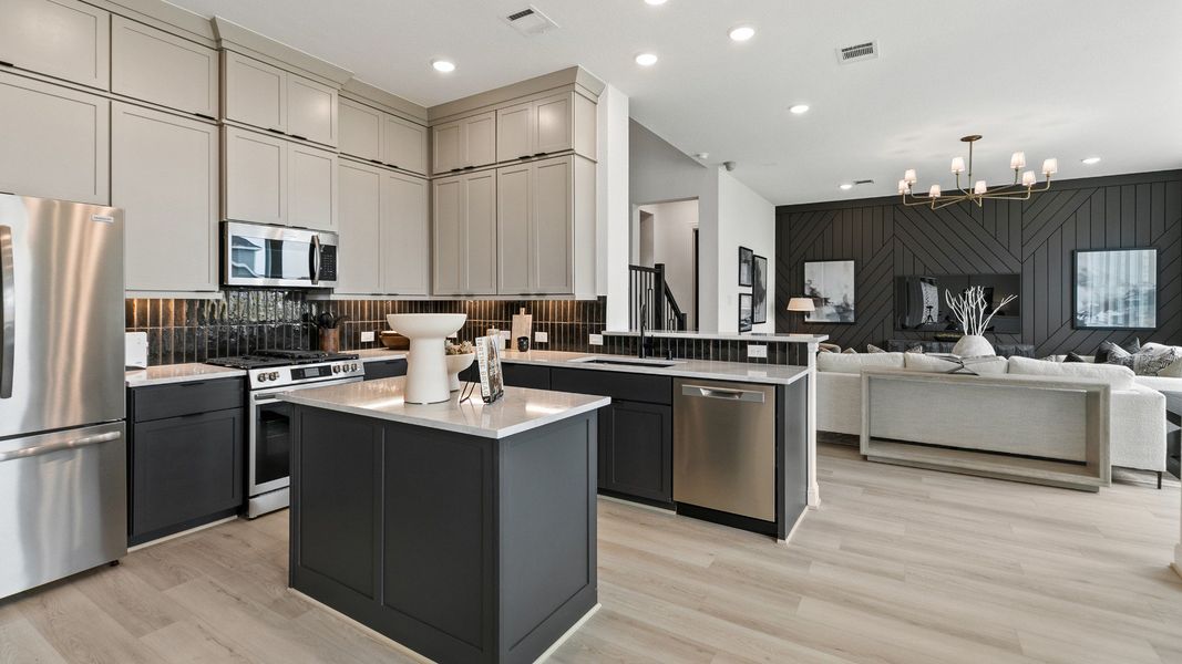 Representative furnished interior of a home built from the Mimosa by Brightland Homes in Sunterra, Katy (Image 14).