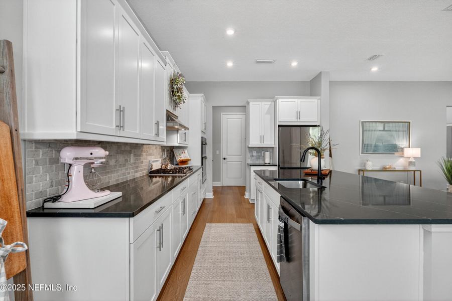 Furnished interior view inside a new home in RiverTown - WaterSong, St. Johns (Image 17).