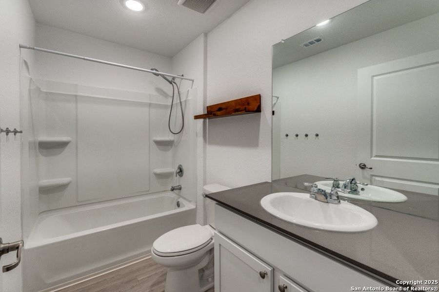 Furnished interior view inside a new home in Mission del Lago: Cottage Collection, San Antonio (Image 10).