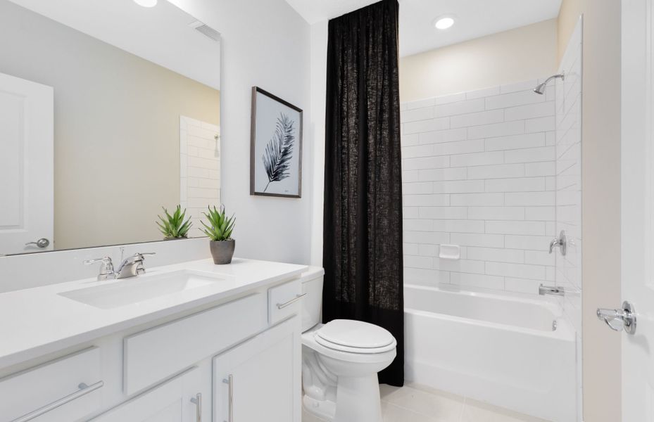 Representative furnished interior of a home built from the Jasmine by Pulte Homes in Tohoqua, Kissimmee (Image 10).