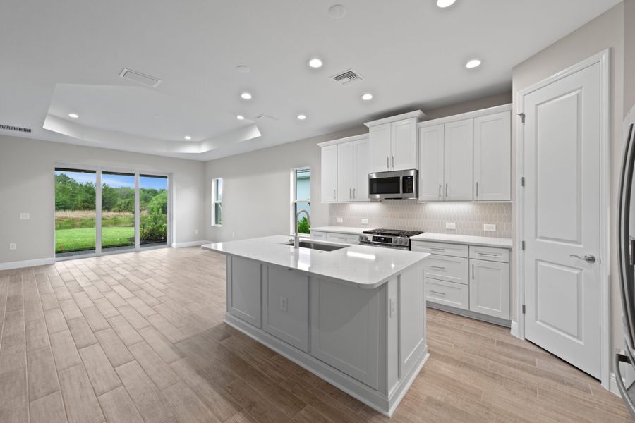 Furnished interior view inside a new home in Verandah, Fort Myers (Image 10).