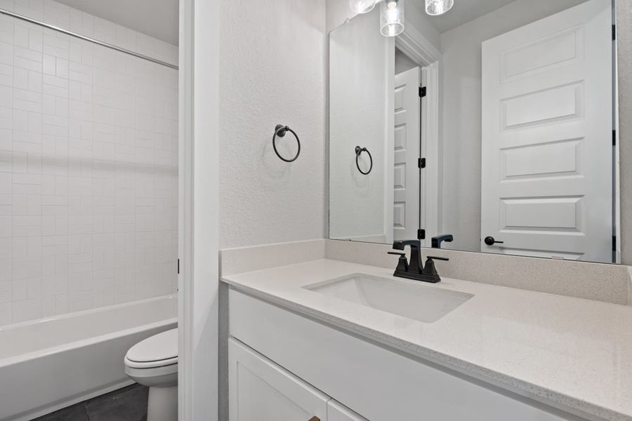 Furnished interior view inside a new home in Terrace Collection at Lariat, Liberty Hill (Image 16). Furnished interior view inside a new home in Terrace Collection at Lariat, Liberty Hill (Image 16).