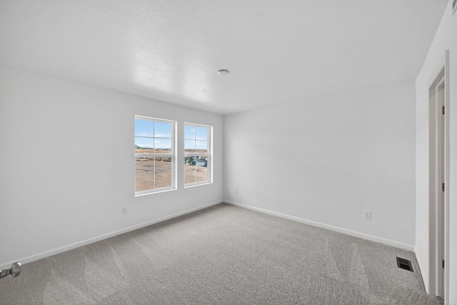 Spacious, unfurnished interior of a new home in Trailstone, Arvada (Image 15).
