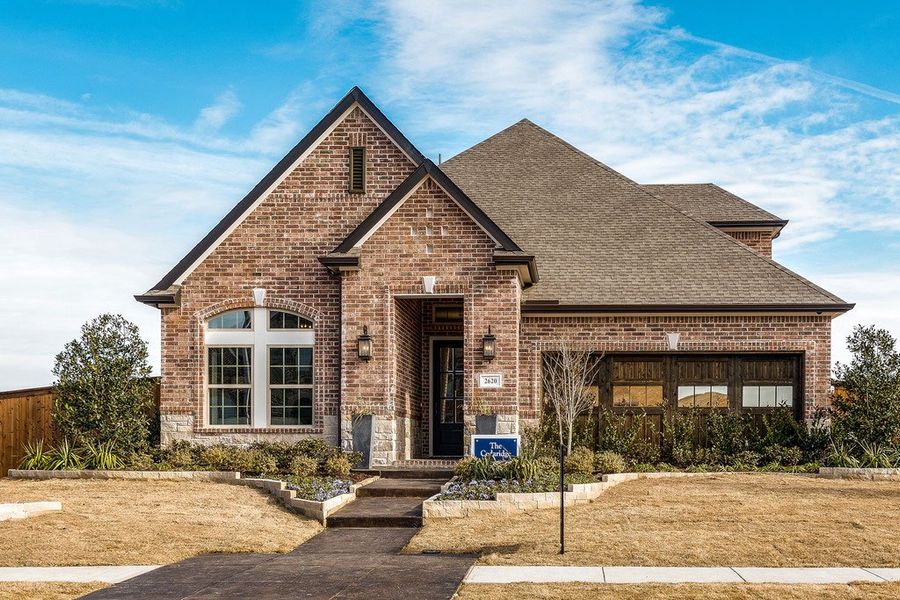 Representative exterior photo of a completed home built from the The Cedaridge by David Weekley Homes in Mustang Lakes, Celina, TX (Image 2).
