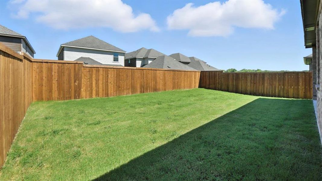 Exterior details and patio area of a home in Bel Air Village, Sherman (Image 3).