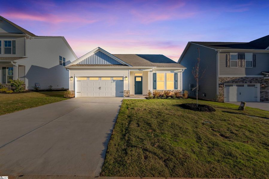 Front exterior of a new home in Halton Oaks, Spartanburg, SC, highlighting curb appeal (Image 20).