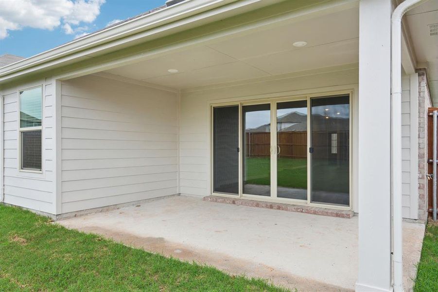 Exterior details and patio area of a home in Lakehaven - Signature Series, Farmersville (Image 3).