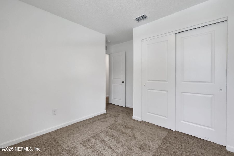 Spacious, unfurnished interior of a new home in Kasen Oaks, Jacksonville (Image 25).