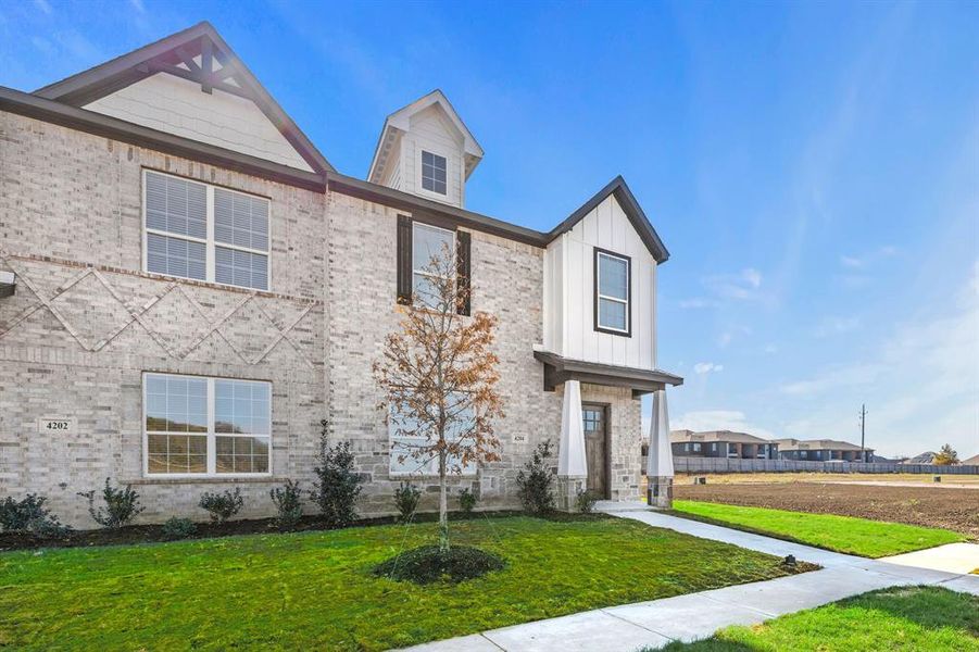 View of front of house with a front lawn