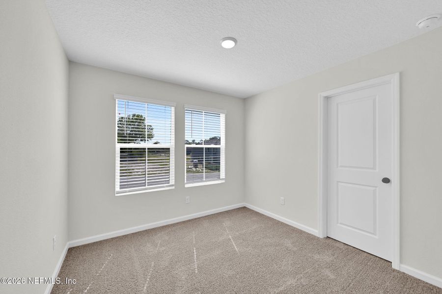 Spacious, unfurnished interior of a new home in Baxley Villas, Middleburg (Image 22).