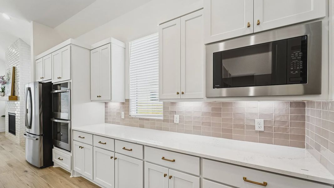 Representative furnished interior of a home built from the Cayman by Chesmar Homes in Crescent Bluff, Georgetown (Image 11).