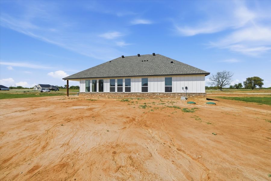 Front exterior of a new home in Zion Valley, Poolville, TX, highlighting curb appeal (Image 16). Front exterior of a new home in Zion Valley, Poolville, TX, highlighting curb appeal (Image 16).