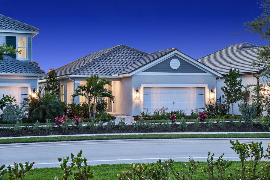 Representative exterior photo of a completed home built from the Dream 2 by Neal Communities in SkySail, Naples, FL (Image 2).