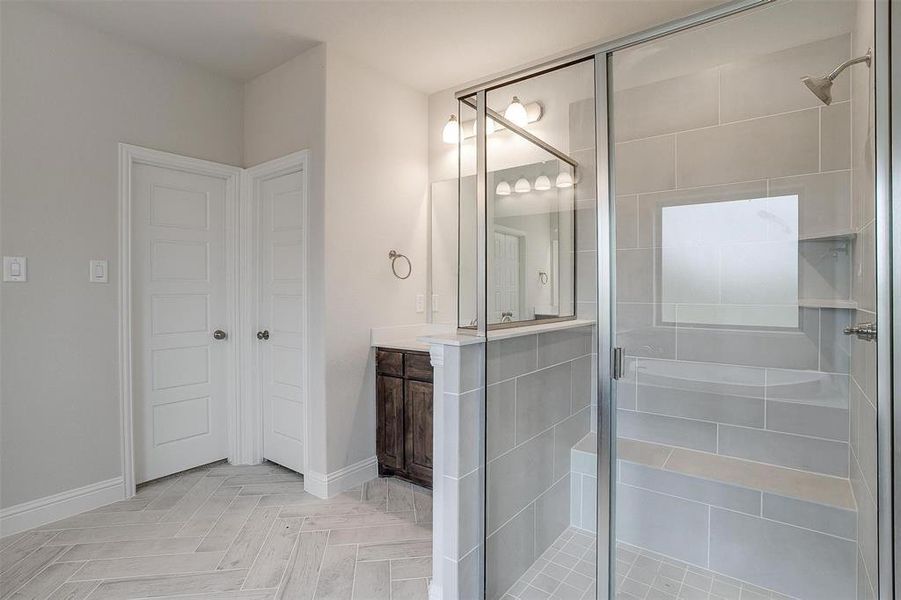 Bathroom with vanity and walk in shower