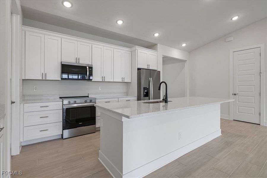 Furnished interior view inside a new home in Cape Coral, Cape Coral (Image 6).