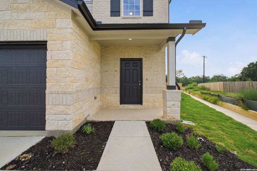 Exterior details and patio area of a home in Garden Grove, San Antonio (Image 25).