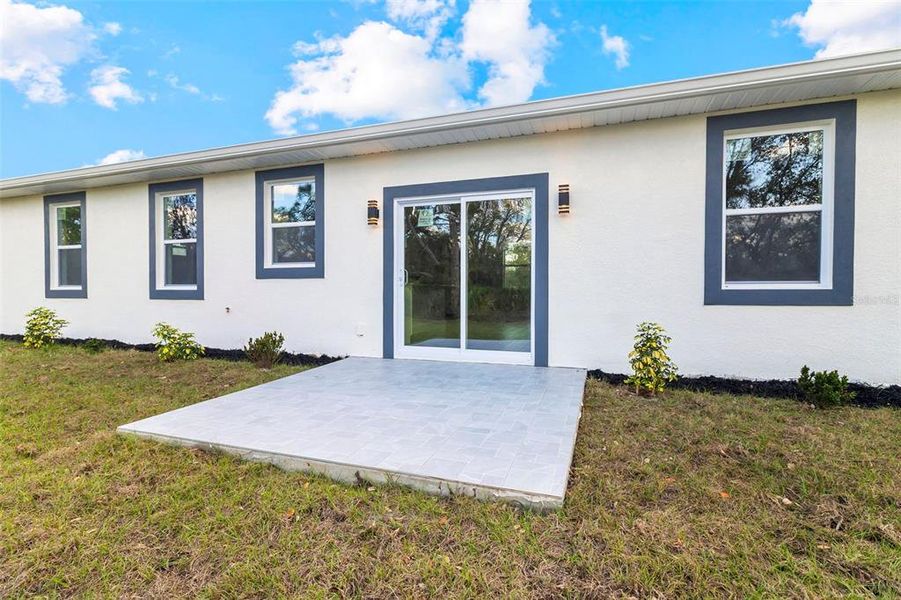 Exterior details and patio area of a home in , North Port (Image 20).