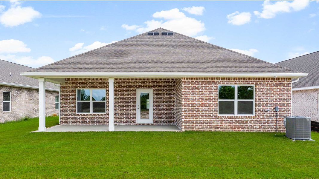 Exterior details and patio area of a home in Holley Grove at Peach Creek, Santa Rosa Beach (Image 3).