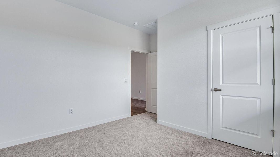 Spacious, unfurnished interior of a new home in Trails at Crowfoot, Parker (Image 43).