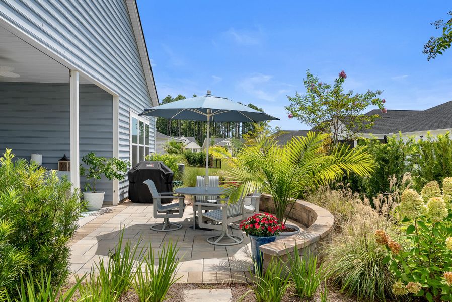 Exterior details and patio area of a home in Horizons at Summers Corner | 55+: The Estates, Summerville (Image 3).