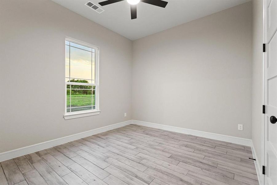 Spare room with light wood finished floors
